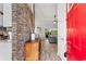 Inviting entryway featuring stone accent wall, modern decor, and tile flooring at 761 Drawbridge Dr., Conway, SC 29526