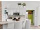 Modern kitchen with white cabinets, stainless appliances, and a cozy breakfast bar at 761 Drawbridge Dr., Conway, SC 29526