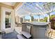 Covered patio featuring a luxurious hot tub, creating the perfect outdoor relaxation and entertainment space at 8050 Wacobee Dr., Myrtle Beach, SC 29579