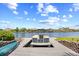 A private dock with a boat and a canoe offers waterfront living with convenient access to recreational water activities at 8050 Wacobee Dr., Myrtle Beach, SC 29579