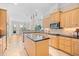Bright kitchen with granite countertops, a kitchen island, and stainless steel appliances at 8050 Wacobee Dr., Myrtle Beach, SC 29579