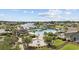 A community pool with a splash fountain and lake views enhances the recreational appeal and the waterfront community living at 8050 Wacobee Dr., Myrtle Beach, SC 29579