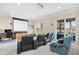 Theater room with projector screen, comfortable seating, and sliding glass doors at 8050 Wacobee Dr., Myrtle Beach, SC 29579