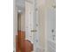 Bathroom showing an open doorway with shower and a second door leading to hallway at 832 Pembridge Ct., Myrtle Beach, SC 29579