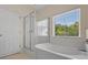 Bathroom featuring large bathtub and a glass enclosed shower at 832 Pembridge Ct., Myrtle Beach, SC 29579