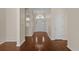 Open foyer featuring hardwood floors that create an inviting and spacious entrance to the home at 832 Pembridge Ct., Myrtle Beach, SC 29579