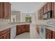 Efficient kitchen with cherry cabinets, a breakfast bar and modern appliances, open to the living areas at 832 Pembridge Ct., Myrtle Beach, SC 29579