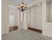 Open concept space with neutral walls and carpet with arched doorways leading to other rooms at 832 Pembridge Ct., Myrtle Beach, SC 29579