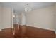 Open concept living area featuring gleaming hardwood floors and neutral walls, ready for personalization at 832 Pembridge Ct., Myrtle Beach, SC 29579