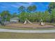 This community playground features multiple slides, climbing structures, and a padded ground for safe playtime at 832 Pembridge Ct., Myrtle Beach, SC 29579
