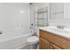 This bathroom features a standard tub, a single vanity, modern fixtures, and convenient storage shelves at 853 Derbyshire Ct., Conway, SC 29526
