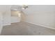 Spacious bonus room featuring neutral carpet, modern ceiling fan and recessed lighting at 853 Derbyshire Ct., Conway, SC 29526