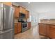 Modern kitchen with stainless steel appliances and wood cabinetry at 853 Derbyshire Ct., Conway, SC 29526