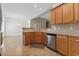 Kitchen featuring wood cabinets, stainless steel appliances, and granite countertops at 853 Derbyshire Ct., Conway, SC 29526