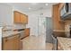 Kitchen with stainless steel appliances, granite countertops, and wood cabinetry at 853 Derbyshire Ct., Conway, SC 29526