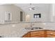 Open concept kitchen with granite countertops and stainless steel sink at 853 Derbyshire Ct., Conway, SC 29526