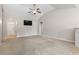 Spacious living room with vaulted ceilings, ceiling fan, and wall-mounted television at 853 Derbyshire Ct., Conway, SC 29526