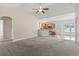 Living room featuring plush carpet with an adjacent kitchen and dining area at 853 Derbyshire Ct., Conway, SC 29526