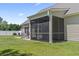 Covered screened in back porch with view of spacious back yard at 853 Derbyshire Ct., Conway, SC 29526
