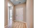 Bright foyer with wood-look flooring and a white front door welcomes you inside at 912 Inlet Keys St., Murrells Inlet, SC 29576
