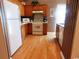 Functional kitchen with classic appliances and warm wood cabinetry at 916 Charles St., North Myrtle Beach, SC 29582