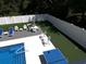 Aerial view of a backyard featuring putting green, pool, ping pong table, and outdoor seating area at 928 Strand Ave. Strand Ave., North Myrtle Beach, SC 29582