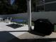 A view of backyard with a ping pong table, grill, and outdoor seating area, great for outdoor activities at 928 Strand Ave. Strand Ave., North Myrtle Beach, SC 29582