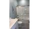Bathroom featuring a glass-enclosed shower, modern vanity, and nautical accents, providing a calming retreat at 928 Strand Ave. Strand Ave., North Myrtle Beach, SC 29582