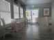 Sunlit dining area with light wood floors and access to an outdoor patio at 928 Strand Ave. Strand Ave., North Myrtle Beach, SC 29582