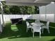 Outdoor area featuring a hot tub, outdoor seating and privacy fence for relaxation and entertainment at 928 Strand Ave. Strand Ave., North Myrtle Beach, SC 29582