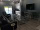 Inviting living room with modern decor and access to the outdoor pool area at 928 Strand Ave. Strand Ave., North Myrtle Beach, SC 29582