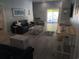 Inviting living room with modern decor and access to the outdoor pool area at 928 Strand Ave. Strand Ave., North Myrtle Beach, SC 29582