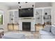 Cozy fireplace with custom built-in shelving and modern details at 9449 Freewoods Rd., Myrtle Beach, SC 29588