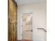 Hallway with decorative barn door and view of the carpeted attic space at 9449 Freewoods Rd., Myrtle Beach, SC 29588