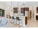 Bright open kitchen with stainless appliances, hardwood flooring and island seating at 9449 Freewoods Rd., Myrtle Beach, SC 29588