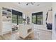 Large walk-in closet with custom shelving, storage, and hardwood floors at 9449 Freewoods Rd., Myrtle Beach, SC 29588