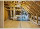 Unfinished attic space showcasing the roof structure and ventilation system at 962 Witherbee Way, Little River, SC 29566