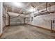Spacious garage with an open door and concrete flooring, ready for parking and storage at 962 Witherbee Way, Little River, SC 29566