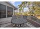 Cozy back patio with outdoor seating and views of the landscaped yard at 9628 Indigo Creek Blvd., Murrells Inlet, SC 29576