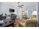 Spacious office with multiple workstations, a ceiling fan, and modern lighting at 9628 Indigo Creek Blvd., Murrells Inlet, SC 29576