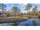 Stunning water view showcasing a tranquil lake and golf course, perfect for relaxation at 9628 Indigo Creek Blvd., Murrells Inlet, SC 29576