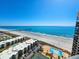 An aerial view of the condo building, showcasing the pool, beach, and ocean views at 9650 Shore Dr. # 2007, Myrtle Beach, SC 29572