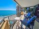 Relaxing balcony with ocean view, lounge chairs, and a table, perfect for enjoying the scenery at 9650 Shore Dr. # 2007, Myrtle Beach, SC 29572