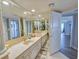 Large bathroom with double sinks, marble countertops, and a bright, open design at 9650 Shore Dr. # 2007, Myrtle Beach, SC 29572
