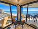 Charming breakfast nook with floor-to-ceiling windows offering panoramic ocean and beach views at 9650 Shore Dr. # 2007, Myrtle Beach, SC 29572