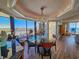 Chic dining room with large windows offering city views and access to a balcony at 9650 Shore Dr. # 2007, Myrtle Beach, SC 29572