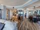 Bright open-concept living area with a bar, a dining area and modern furnishings at 9650 Shore Dr. # 2007, Myrtle Beach, SC 29572