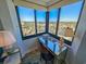 Bright office nook featuring a mirrored desk, comfortable chair, and a scenic city view at 9650 Shore Dr. # 2007, Myrtle Beach, SC 29572