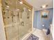 Luxurious shower with custom glass, multiple shower heads, and elegant fixtures, creating a spa-like experience at 9650 Shore Dr. # 2007, Myrtle Beach, SC 29572