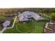 An aerial view showcases the putting green, community lawn and tennis courts at 9994 Beach Club Dr. # 2403, Myrtle Beach, SC 29572